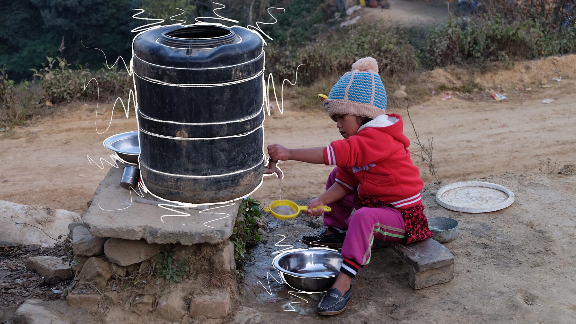 A child pouring water with hand drawn white lines
